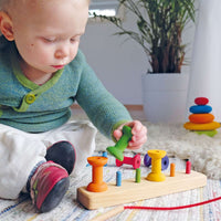 De Kinderwinkel - Grimm's Rijgspel Gekleurde Spoelen